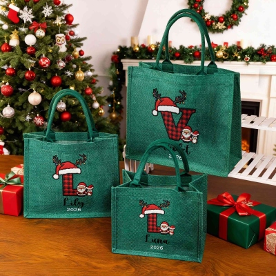 Sacola de juta personalizada com bordado natalino de alce e estampa xadrez, com nome, grande capacidade, nas cores vermelha e verde. Presente de Natal ideal para crianças, família e amigos.