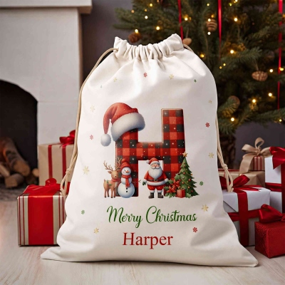 Personalisierte Weihnachtstüte mit kariertem Alphabet und Namen, Weihnachtssack aus Canvas mit Kordelzug, Gastgeschenk für die Weihnachtsfeier, Weihnachtsgeschenk für Kinder