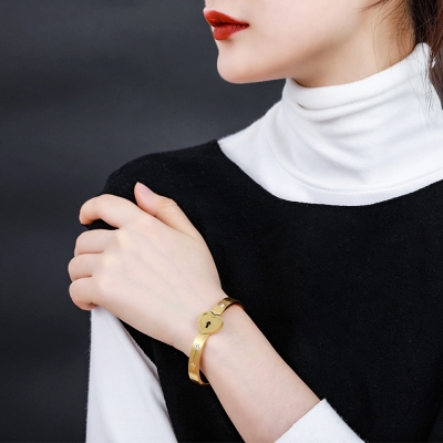 heart bracelet and key necklace