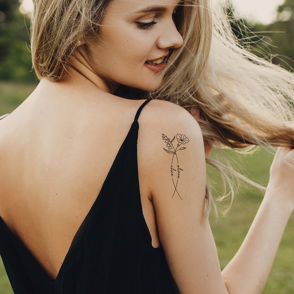 birth month flowers tattooed