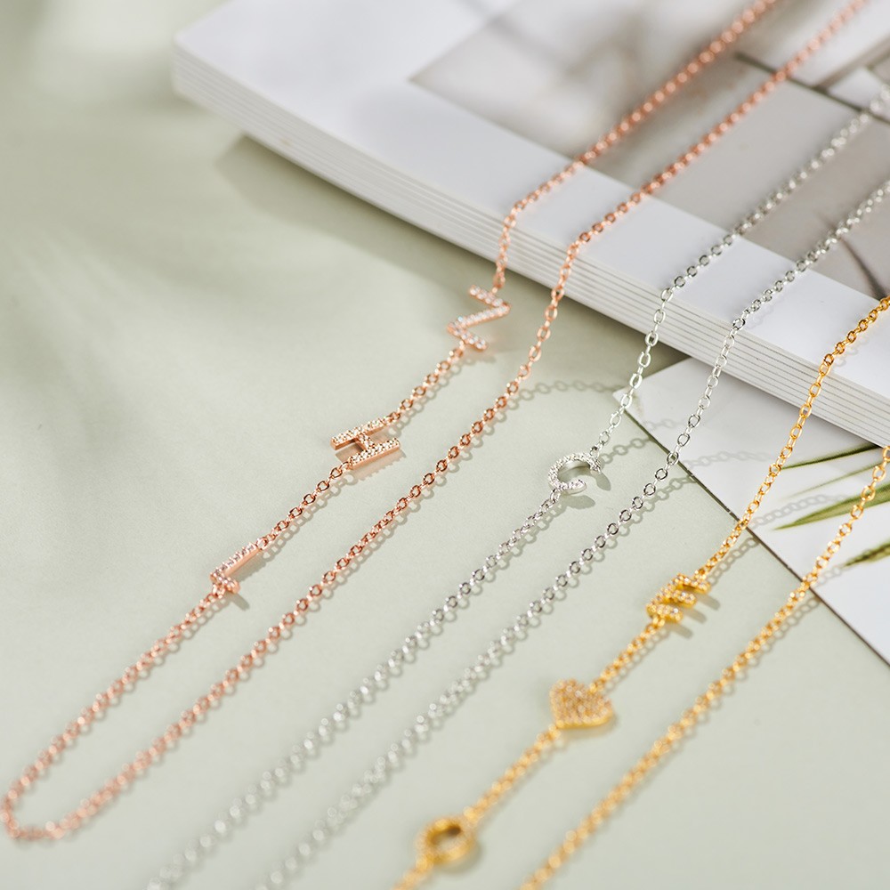 sideways letter necklace