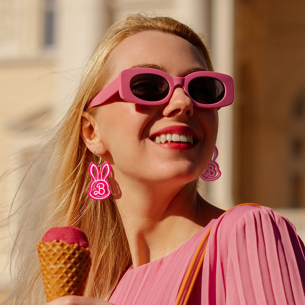 boucles d'oreilles rose vif pendantes