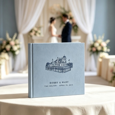Gastenboek met een schets van de trouwlocatie, inclusief namen en datum. Elegant, met lijntekeningen van de namen van het bruidspaar. Een perfect cadeau voor pasgetrouwden/koppels.